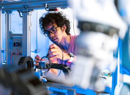 engineer fixing robot