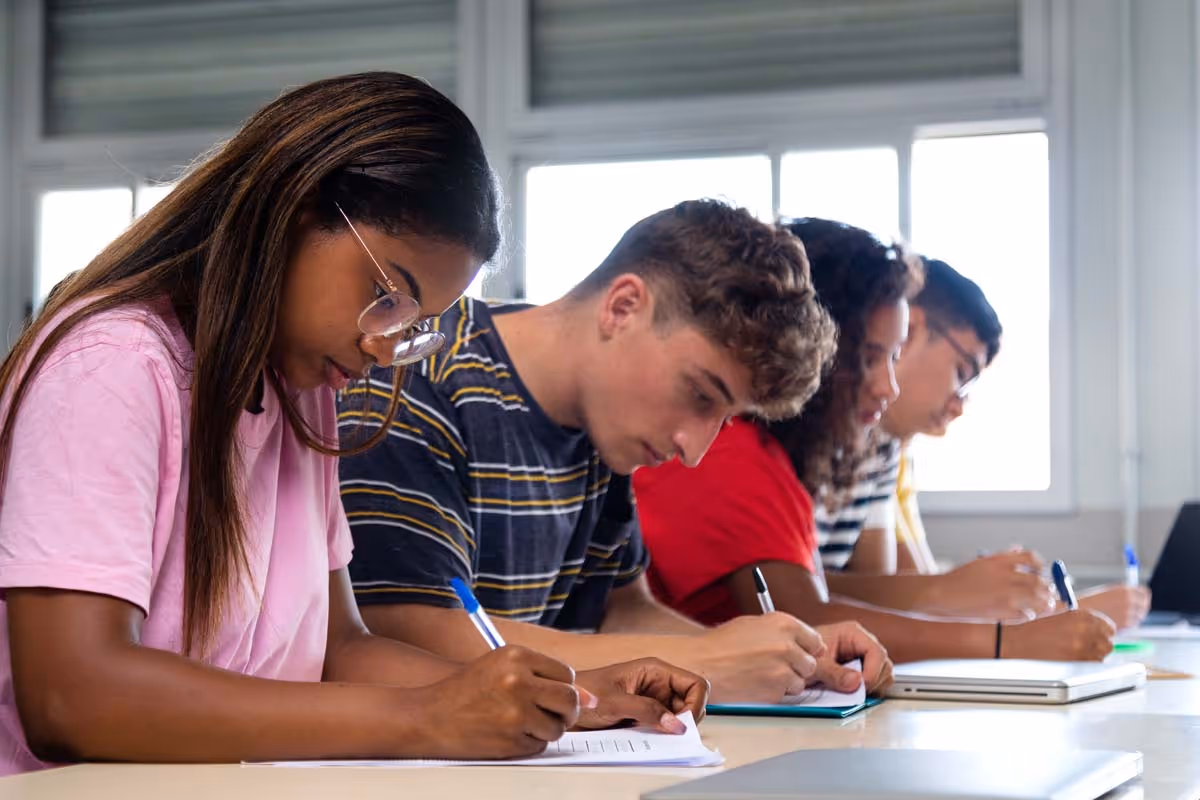 Students working at desk.
