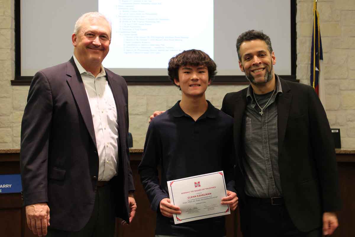 Choir student with teachers and board member
