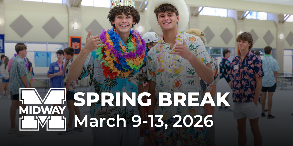 Two high school students smiling at the camera