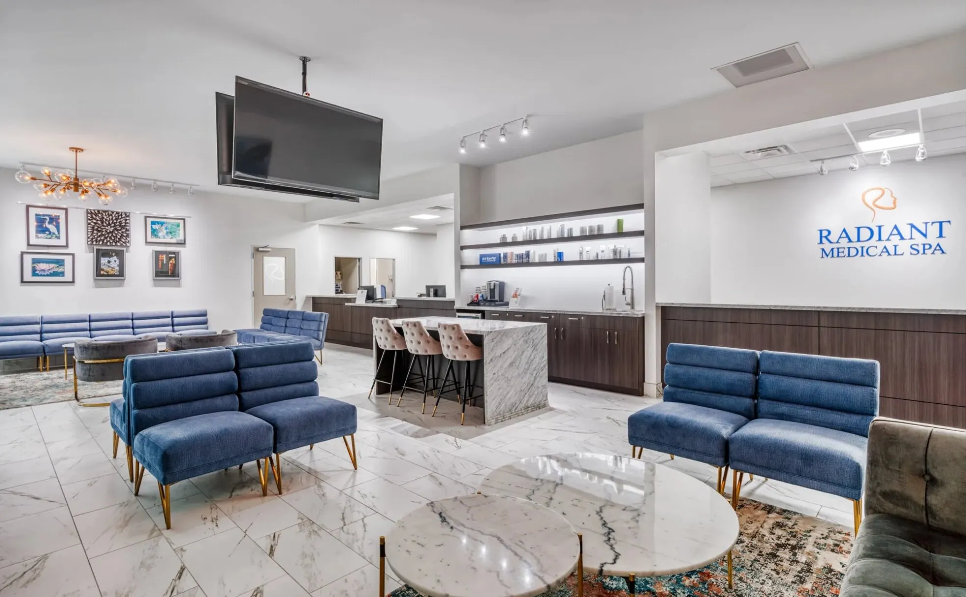 Patient waiting area with blue seating at a Radiant Dermatology and Aesthetics clinic in Greater Houston, Texas