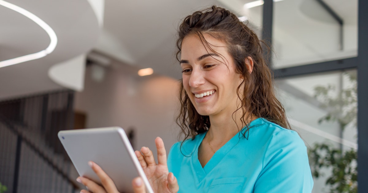 dentist using tablet