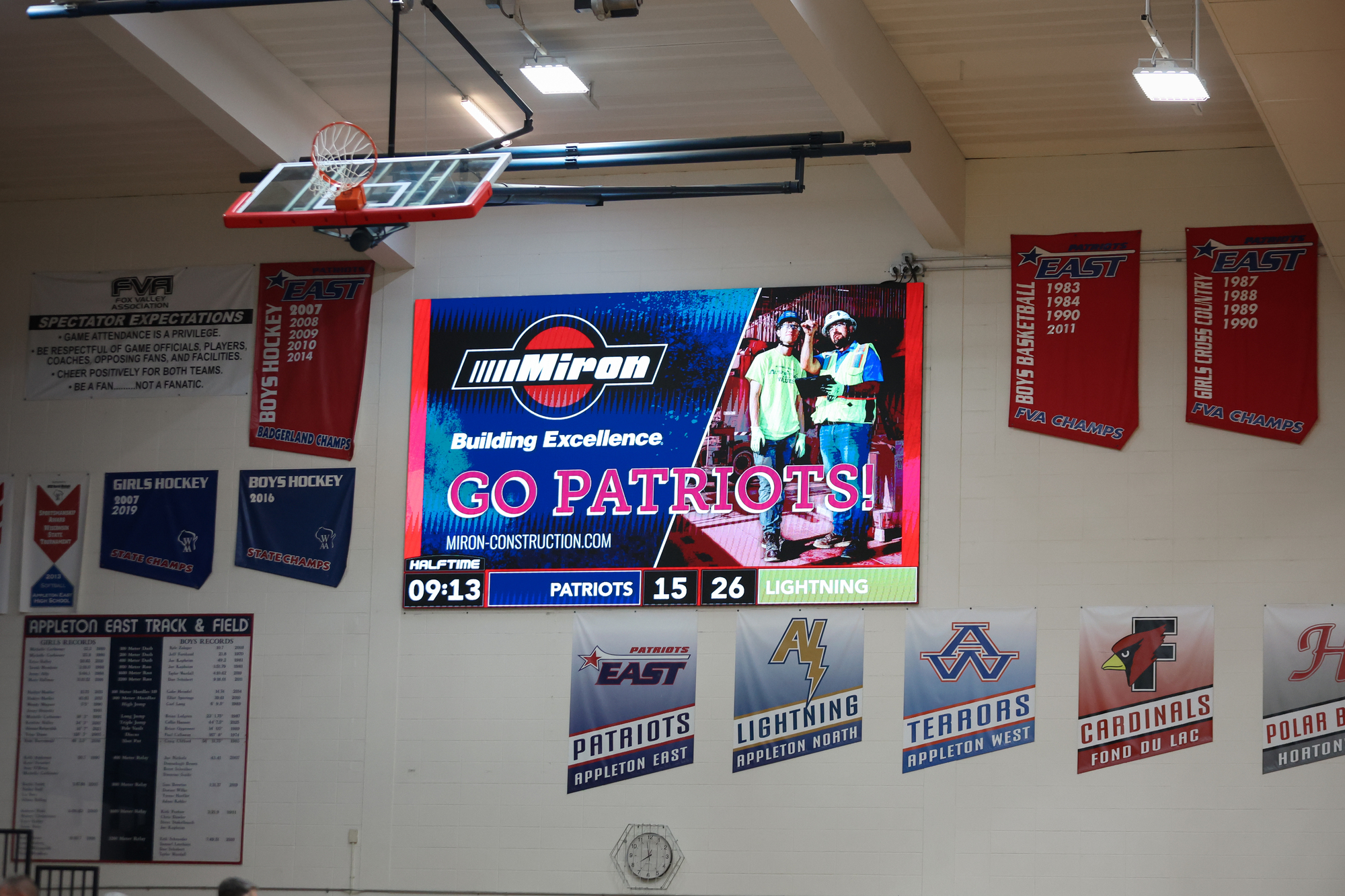 Scoreboard sponsor showing support for Appleton East patriots