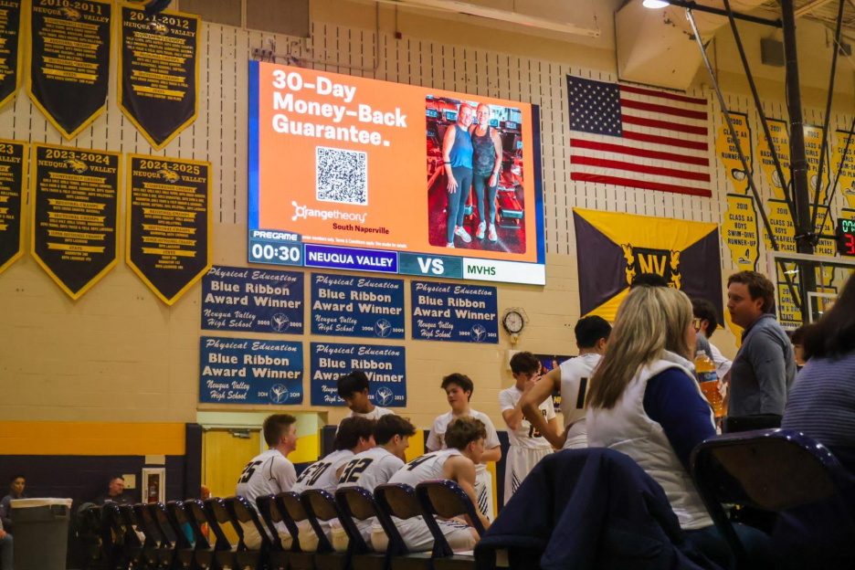 Orange Theory Fitness scoreboard advertisement at Neuqua Valley High School