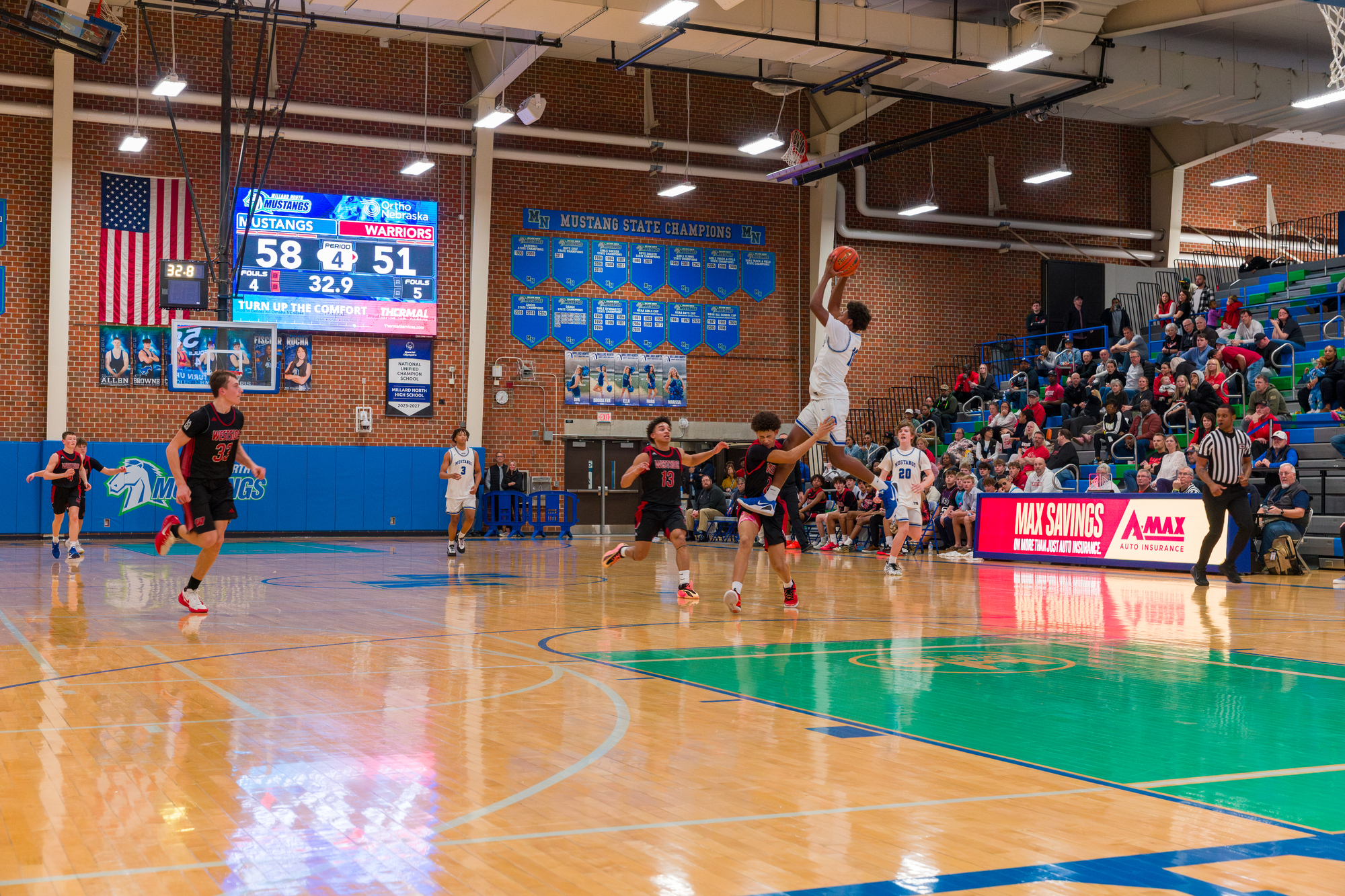 Millard North High School gym scoreboards upgraded by Scoreboard Media