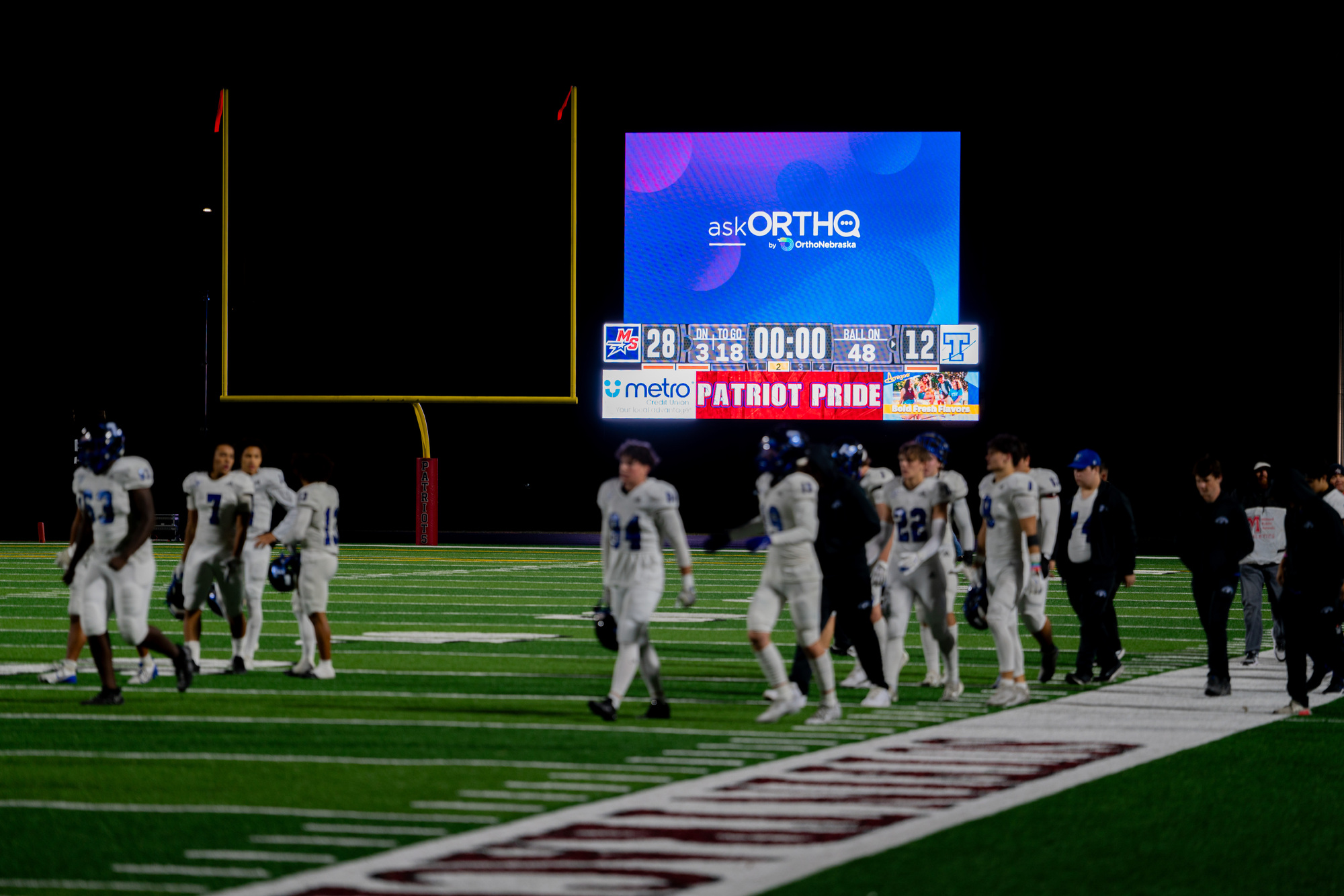 OrthoNebraska scoreboard sponsor at Millard Public Schools seen at the Buell stadium scoreboard