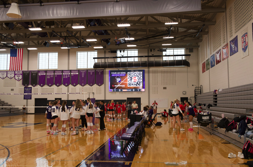 Phoenixville High School scoreboard advertising volleyball