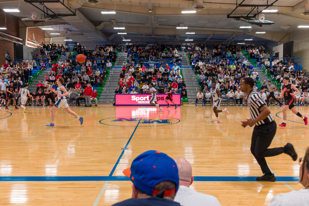 Video LED scorer table by Scoreboard Media in a basketball gym