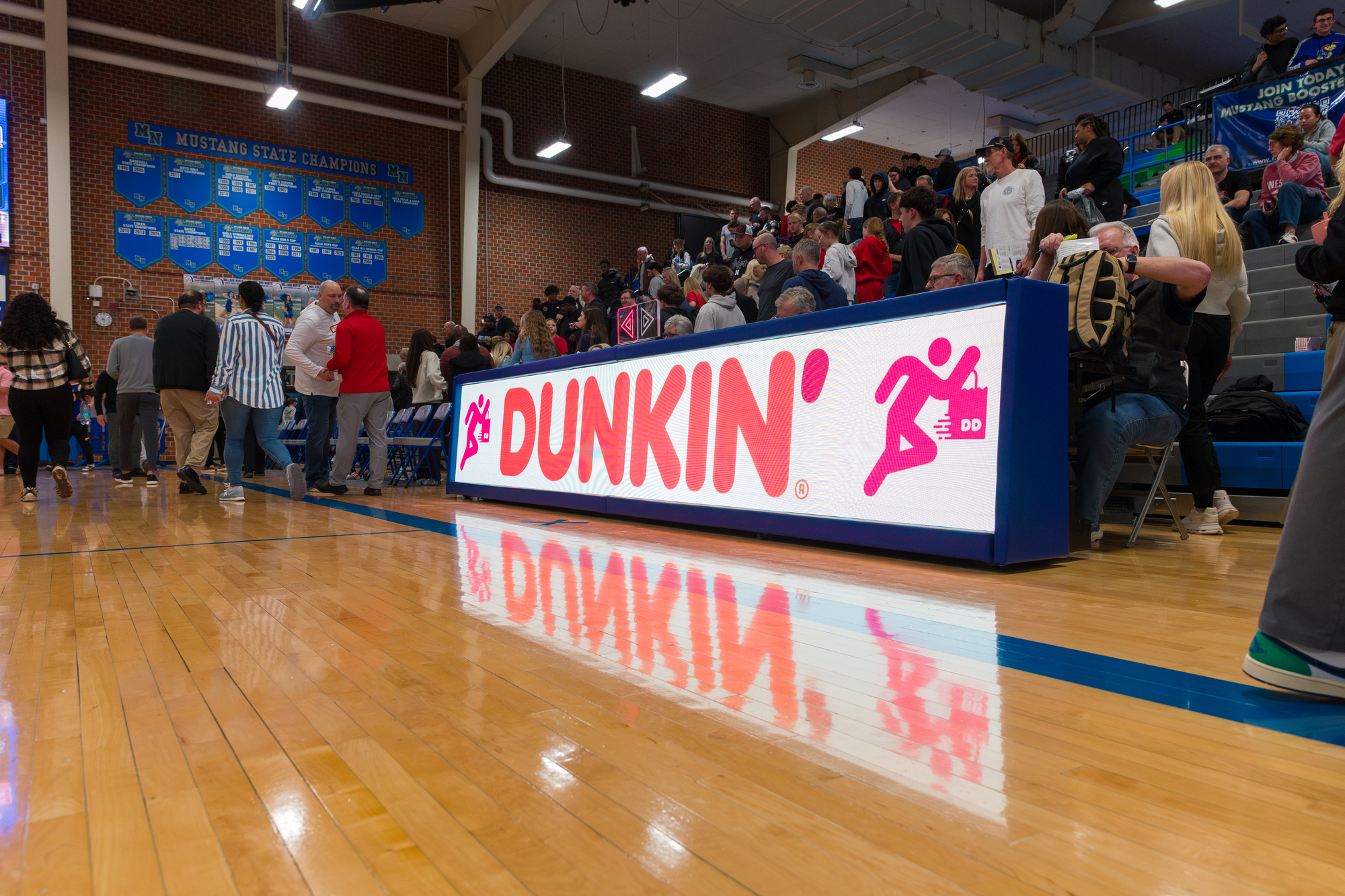 Scorers table Dunkin advertisement