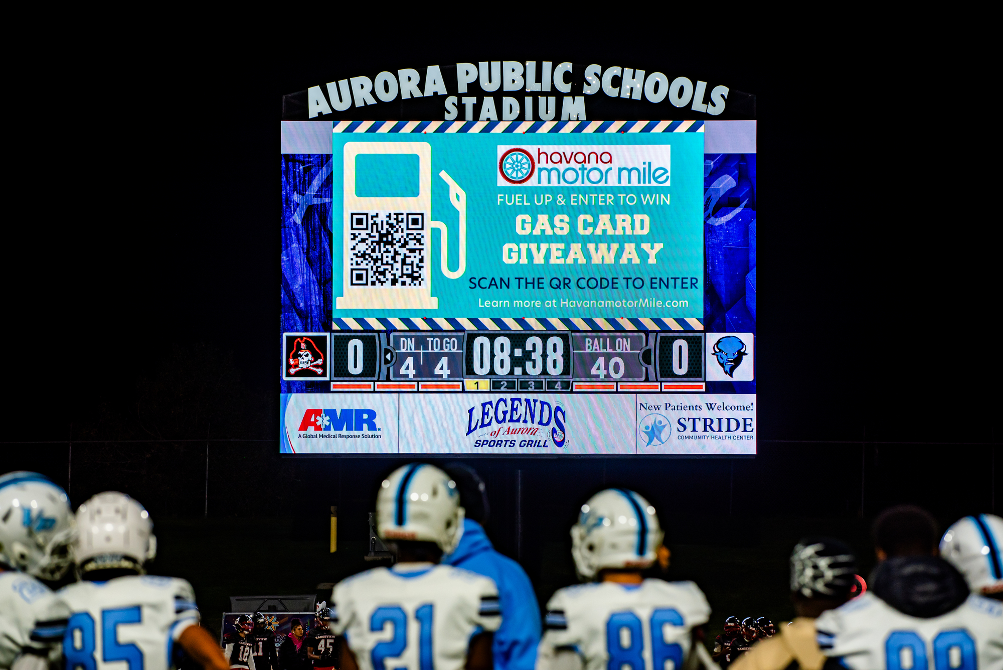 Scoreboard Media brand ads on outdoor scoreboard at Aurora Public Stadium