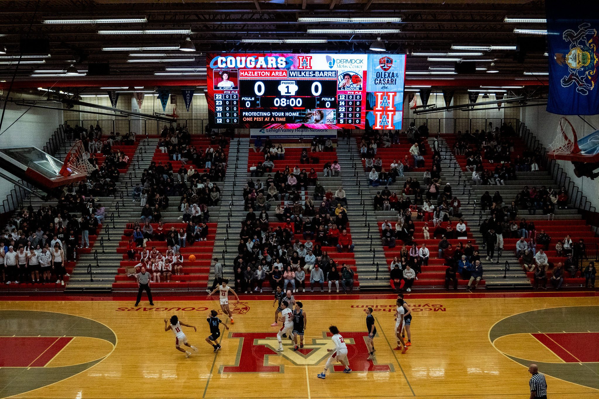Scoreboard Media Brand wrapper on indoor scoreboard at Hazleton Area gym