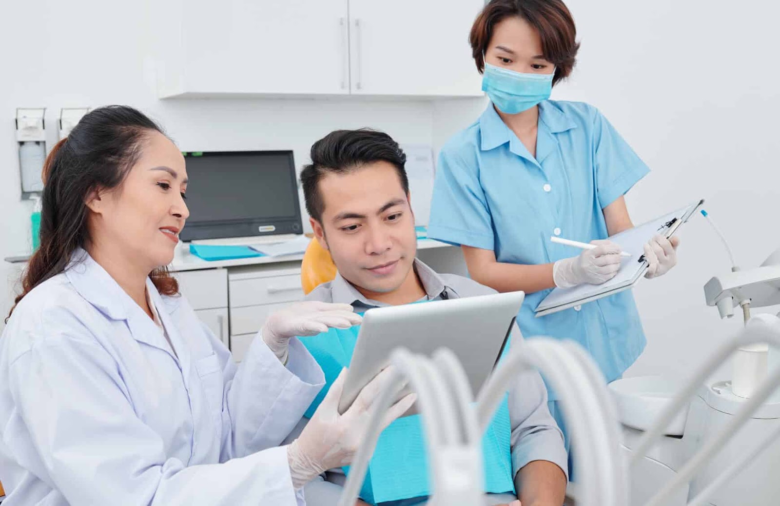 Dentist Examining the Patient's Dental Health to Select The Correct Dental Bone Grafting Procedure.