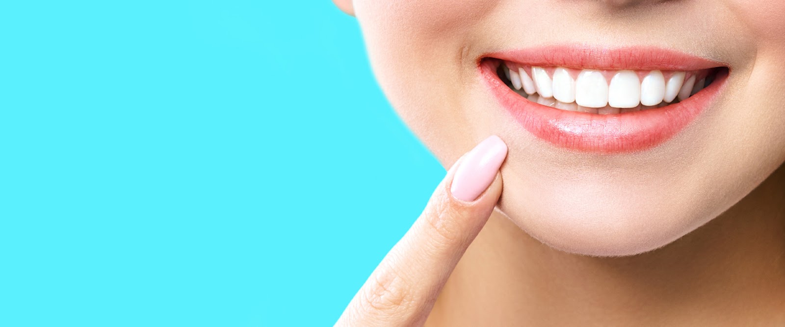 A Happy Patient After Receiving Her Dental Implants Cost Consultation. Discover the Average Cost of Dental Implants at Mercer Island Dental.