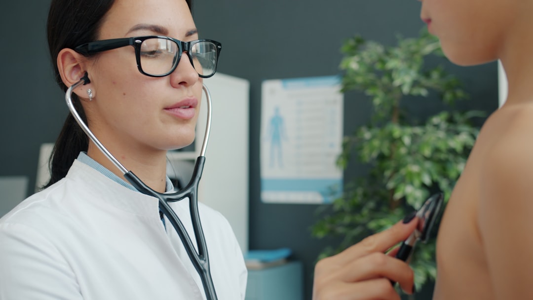 pediatrician examining a child