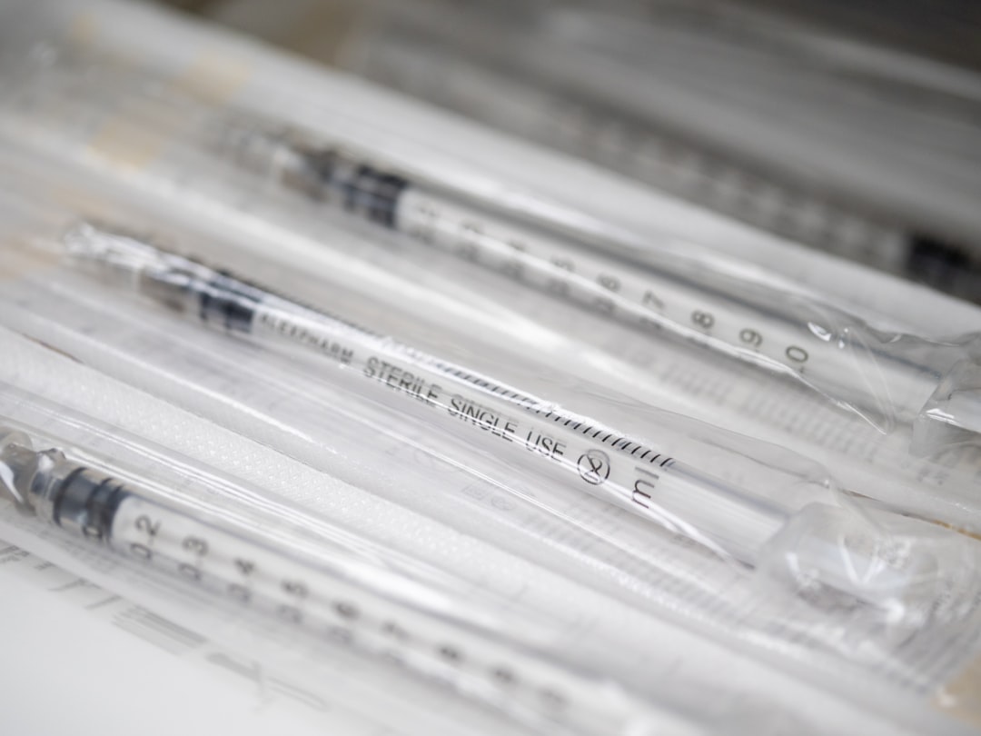 nurse preparing allergy injection