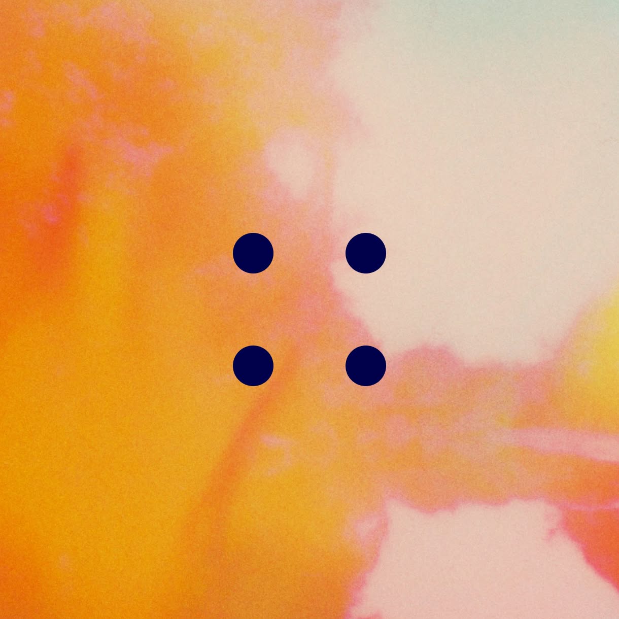 A soft abstract wash of orange, pink, cream, and yellow is overlaid with four evenly spaced navy-blue dots arranged in a square.