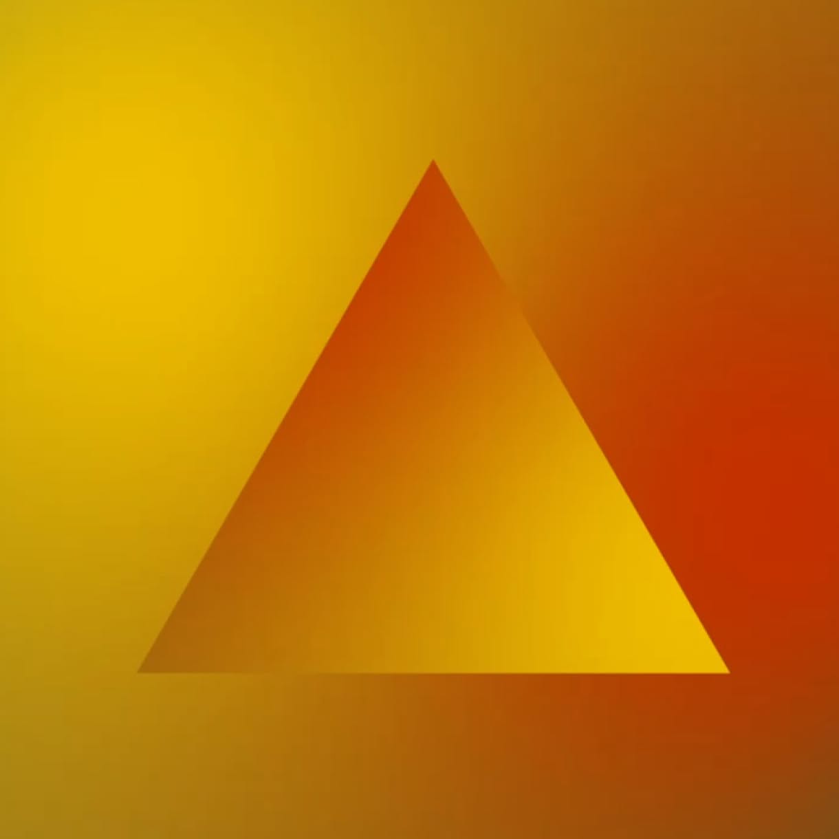 A large orange triangle sits against a softly blurred yellow-to-red gradient background.