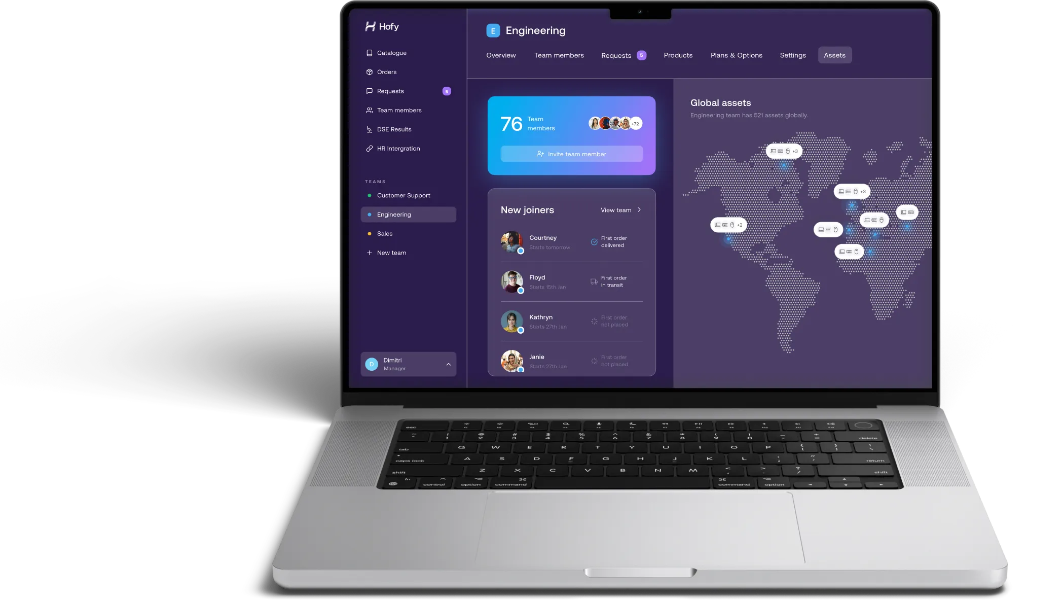A laptop with a purple screen and a world map on the screen.