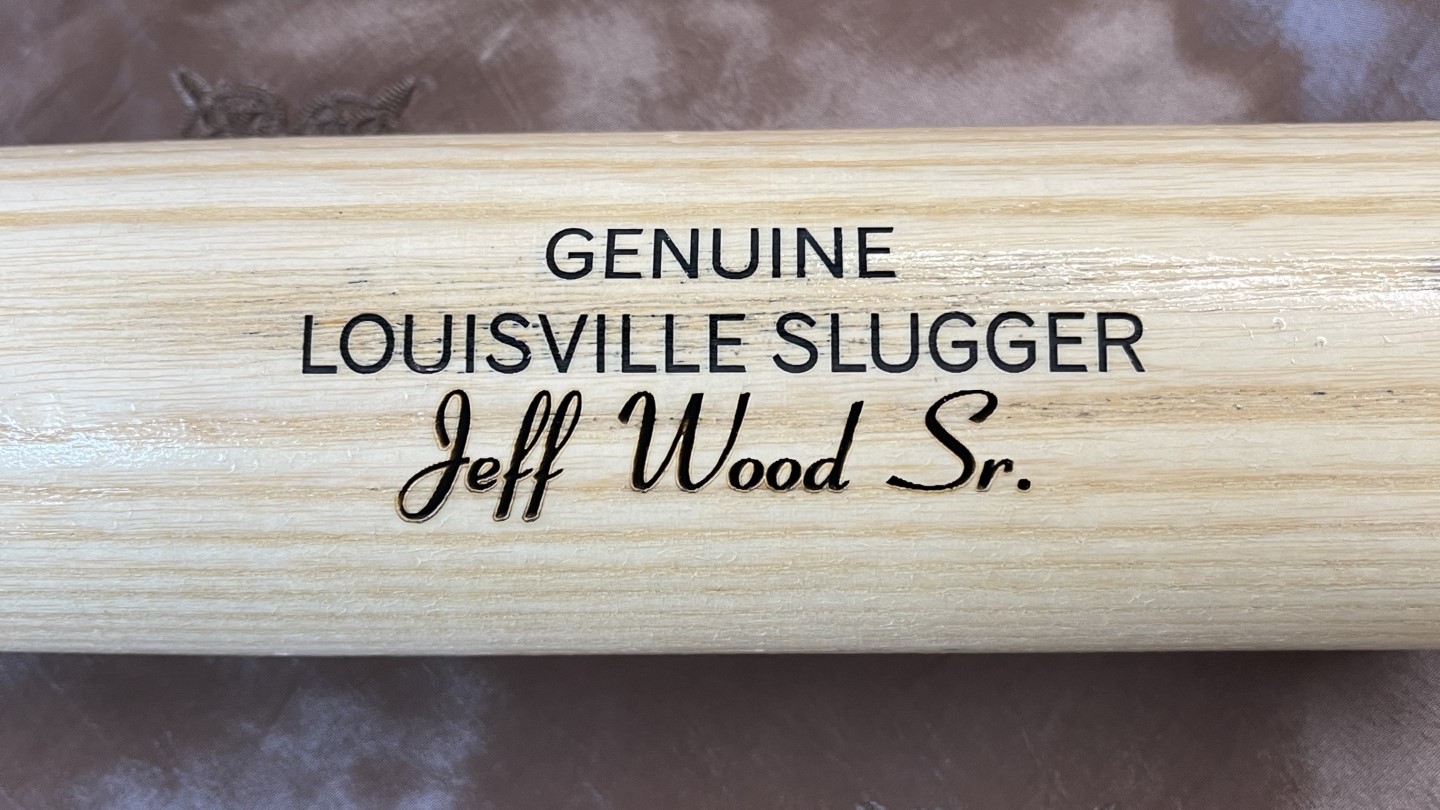 Engraved wooden bat