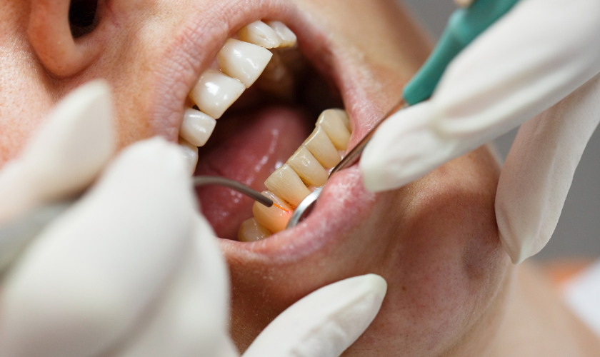 holding mouth in pain | Dental Implant Pain | Encinitas CA