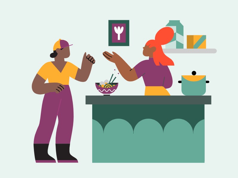 two people in the kitchen