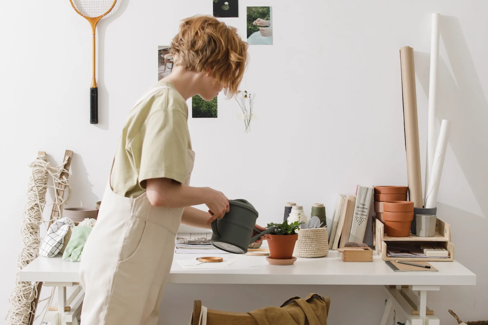 woman watering a plant