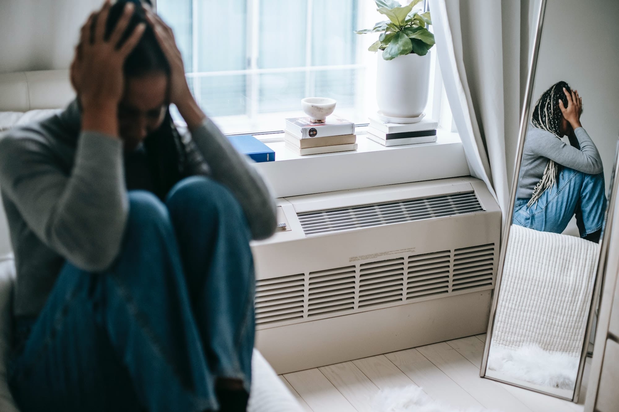 woman upset with mirror