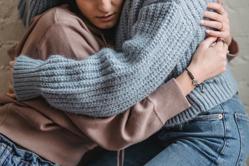 two women embracing
