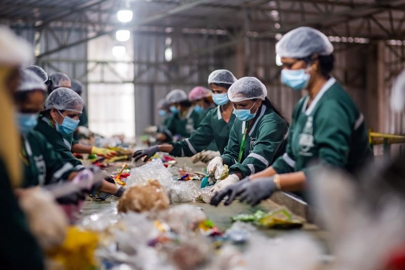 a group of people in a factory