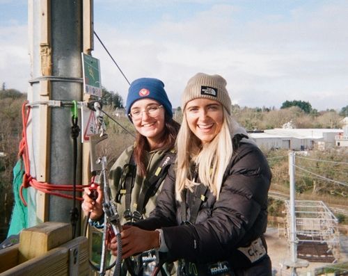 photo of two girls outside smiling