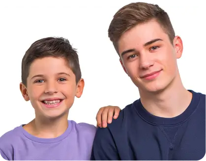Two smiling boys with one putting an arm around the other, representing customized courses.