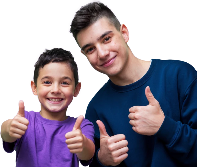 Happy children showing thumbs up in a positive gesture.