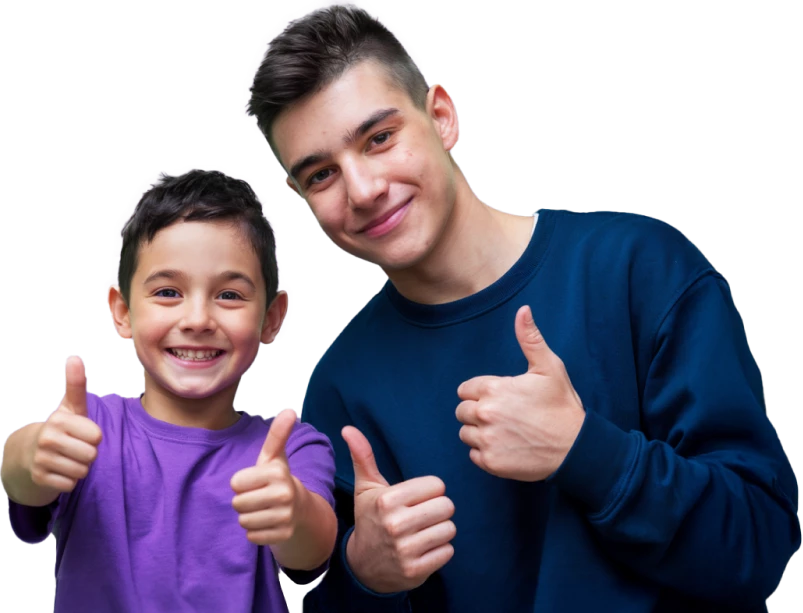 Happy children showing thumbs up in a positive gesture.