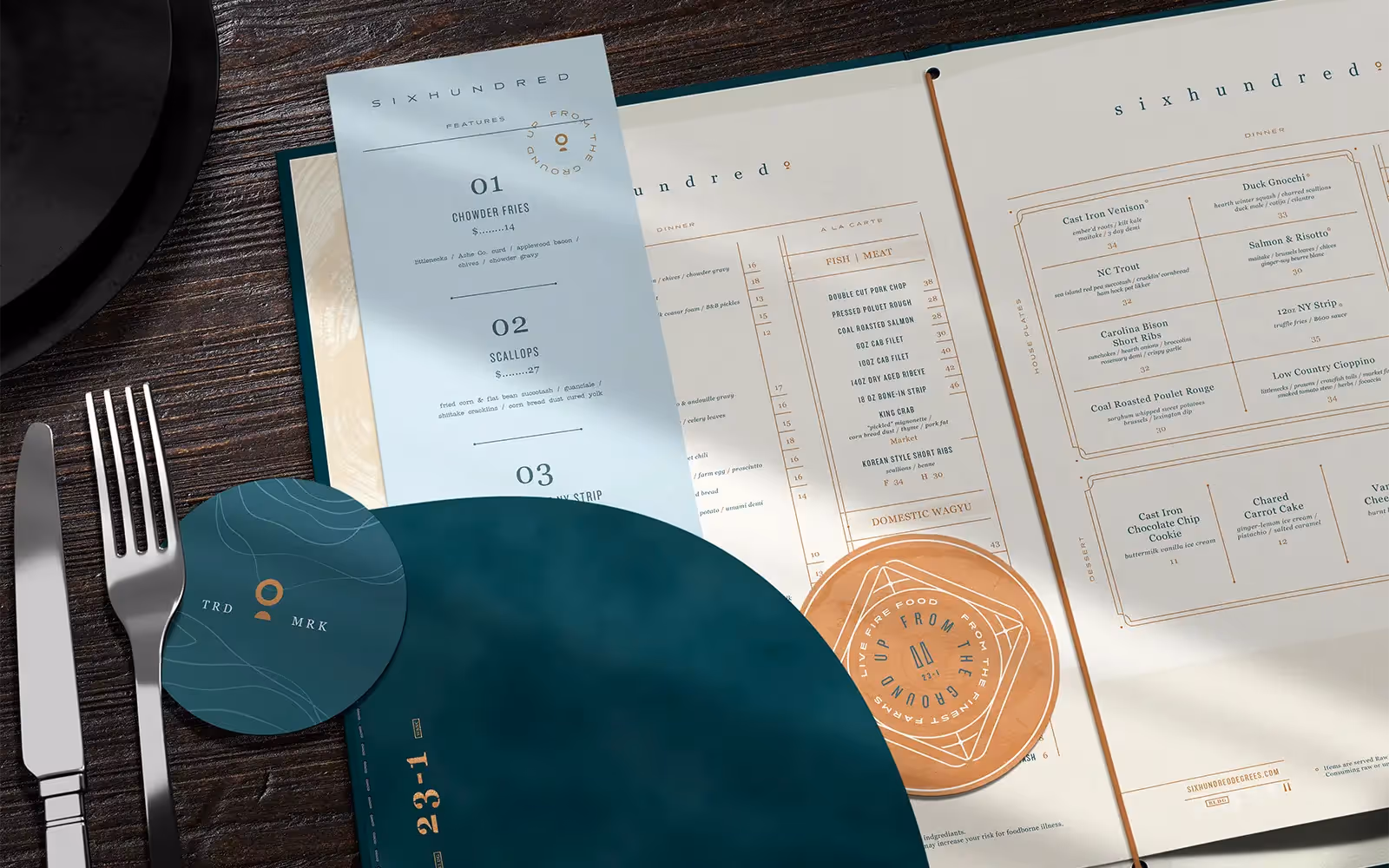 Menu design and custom coasters for an upscale restaurant.