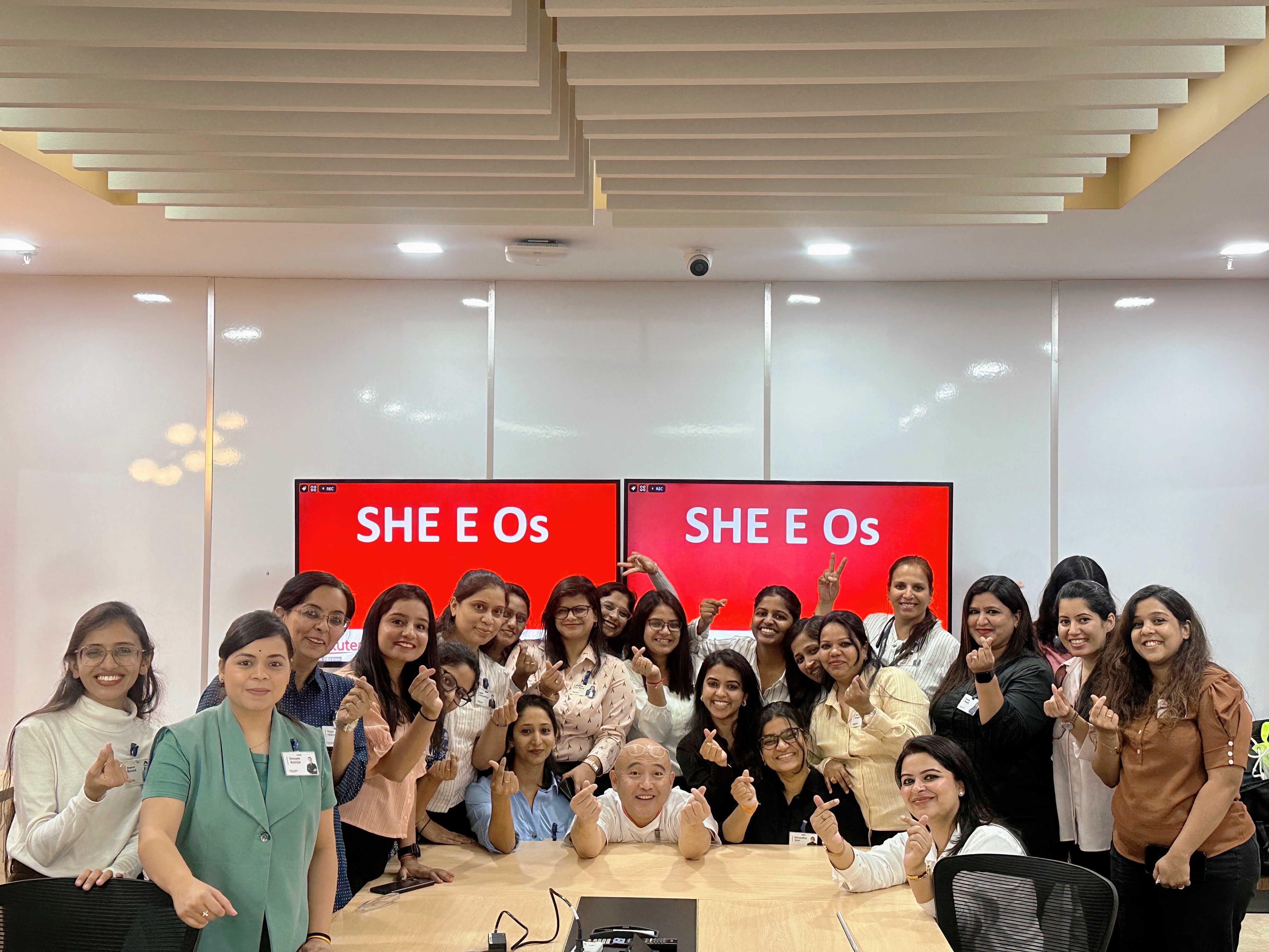 Smriti Sharma and members of the SHE-E-O team