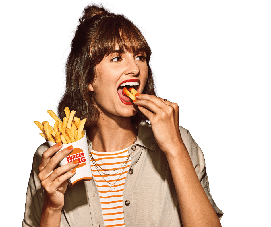 Woman eating fries.