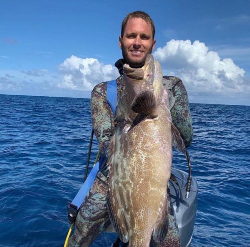 Brett Roach holding grouper