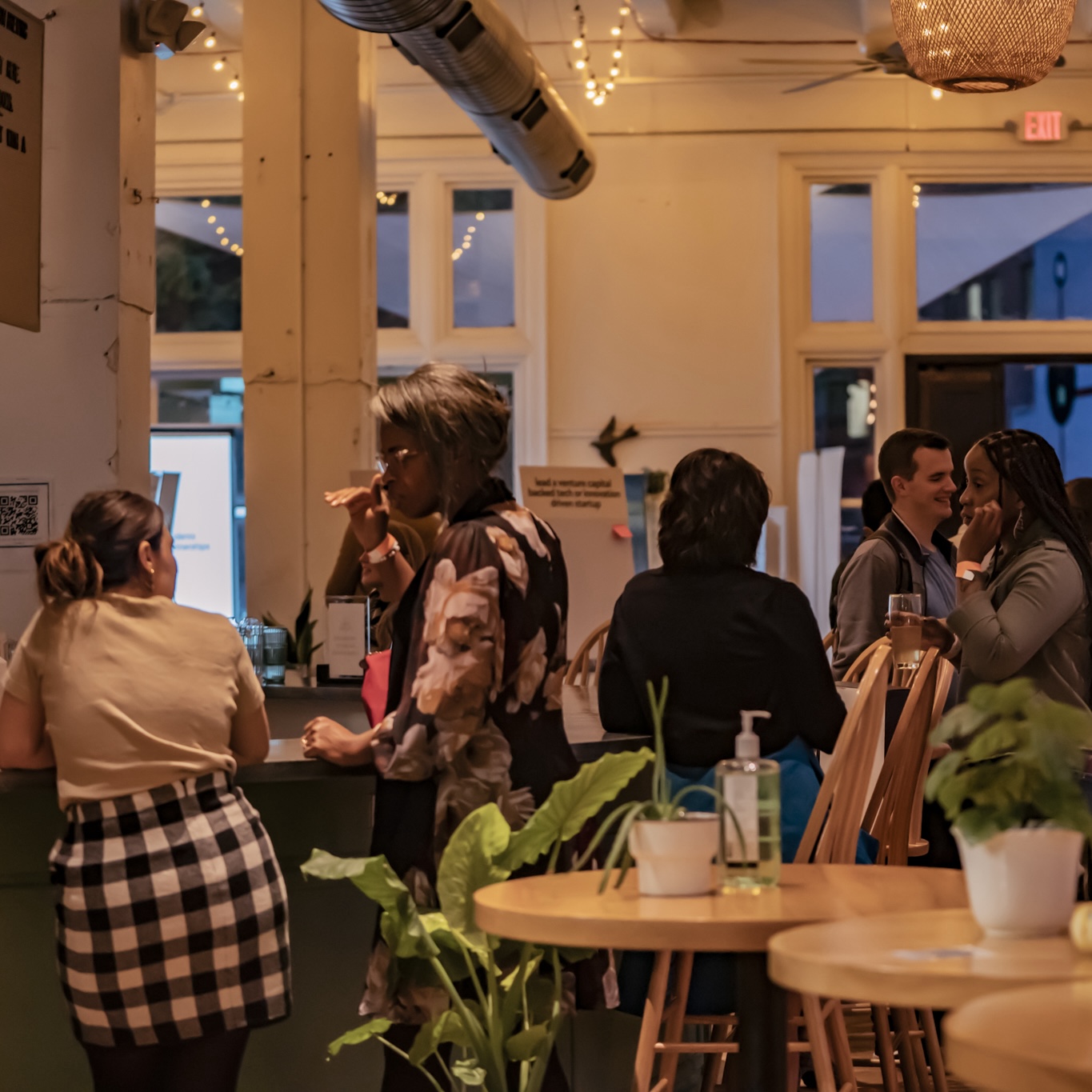 three people sitting on couch