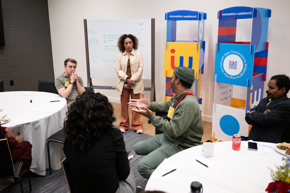 group sitting on couches at party
