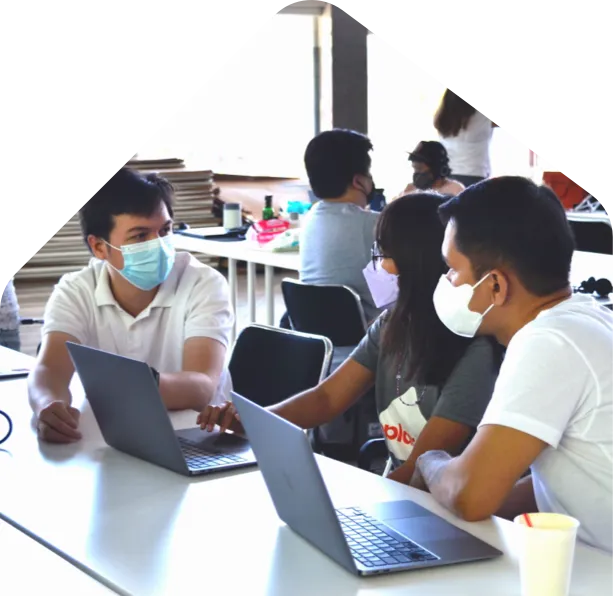 A group of people conversing, image