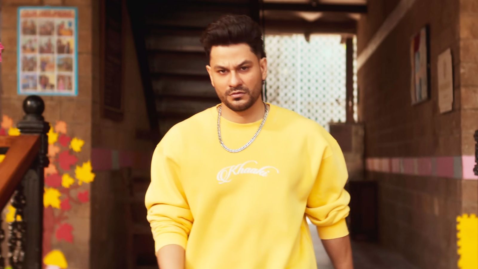 Image may contain Kunal Khemu Clothing Sleeve Face Head Person Adult Accessories Jewelry Necklace and Black Hair