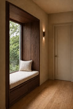 Hallway window seating illustrating a place to pause within a circulation space.