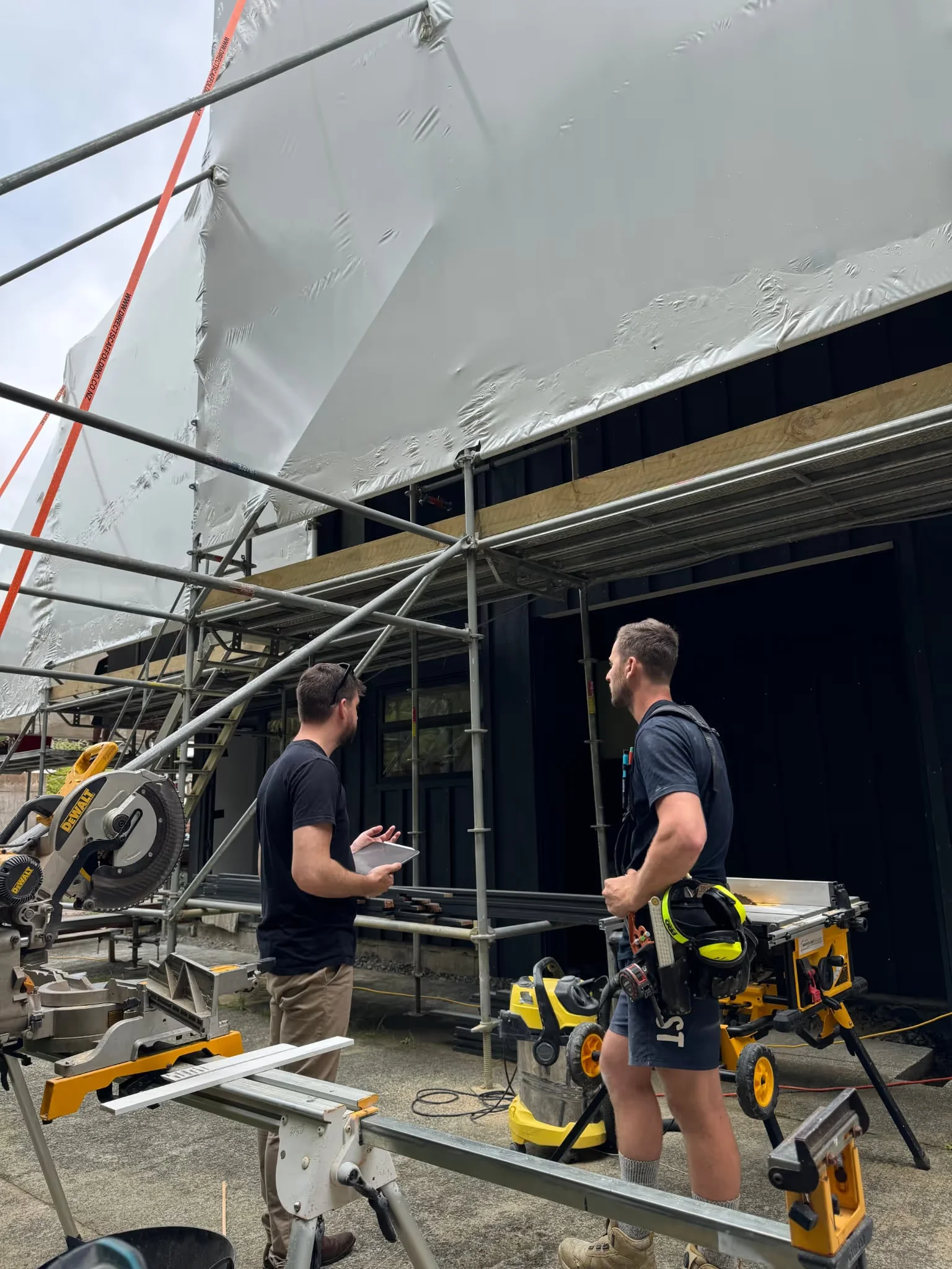 Construction Site Meeting - Modal Architecture - Two Men talking renovations