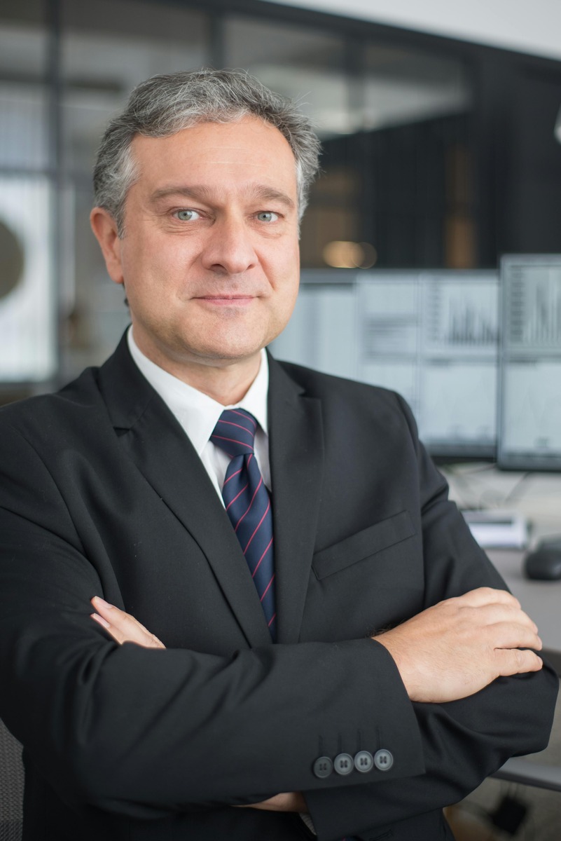 Smiling financial advisor in business professional clothing