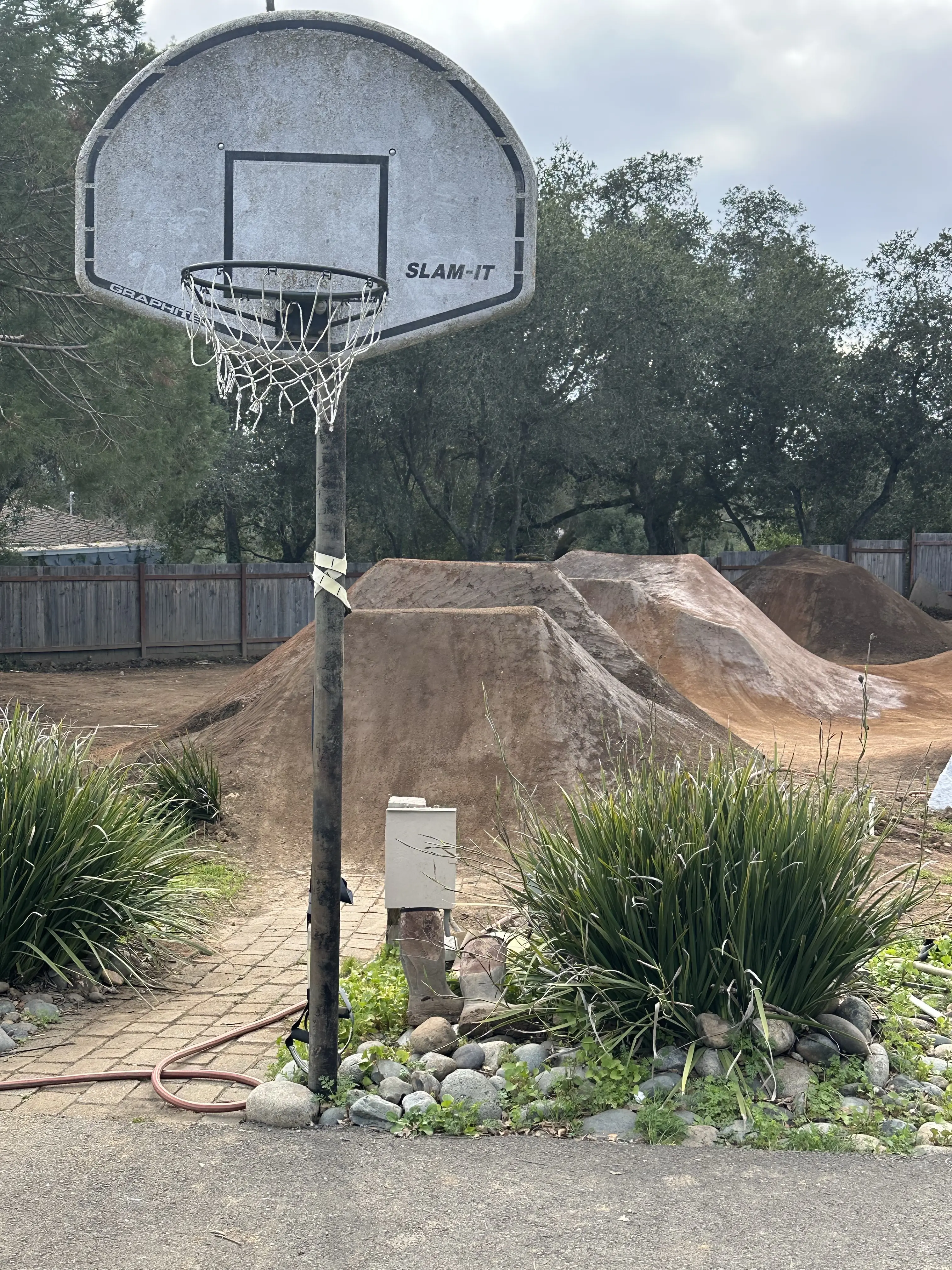 Backyard Mountain Bike trail, bmx pumptracks, dirt jumps, and wooden ramps