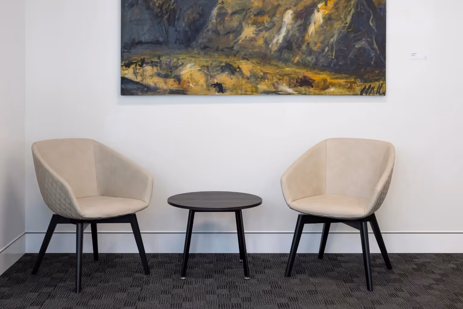 reception chairs and coffee table in office
