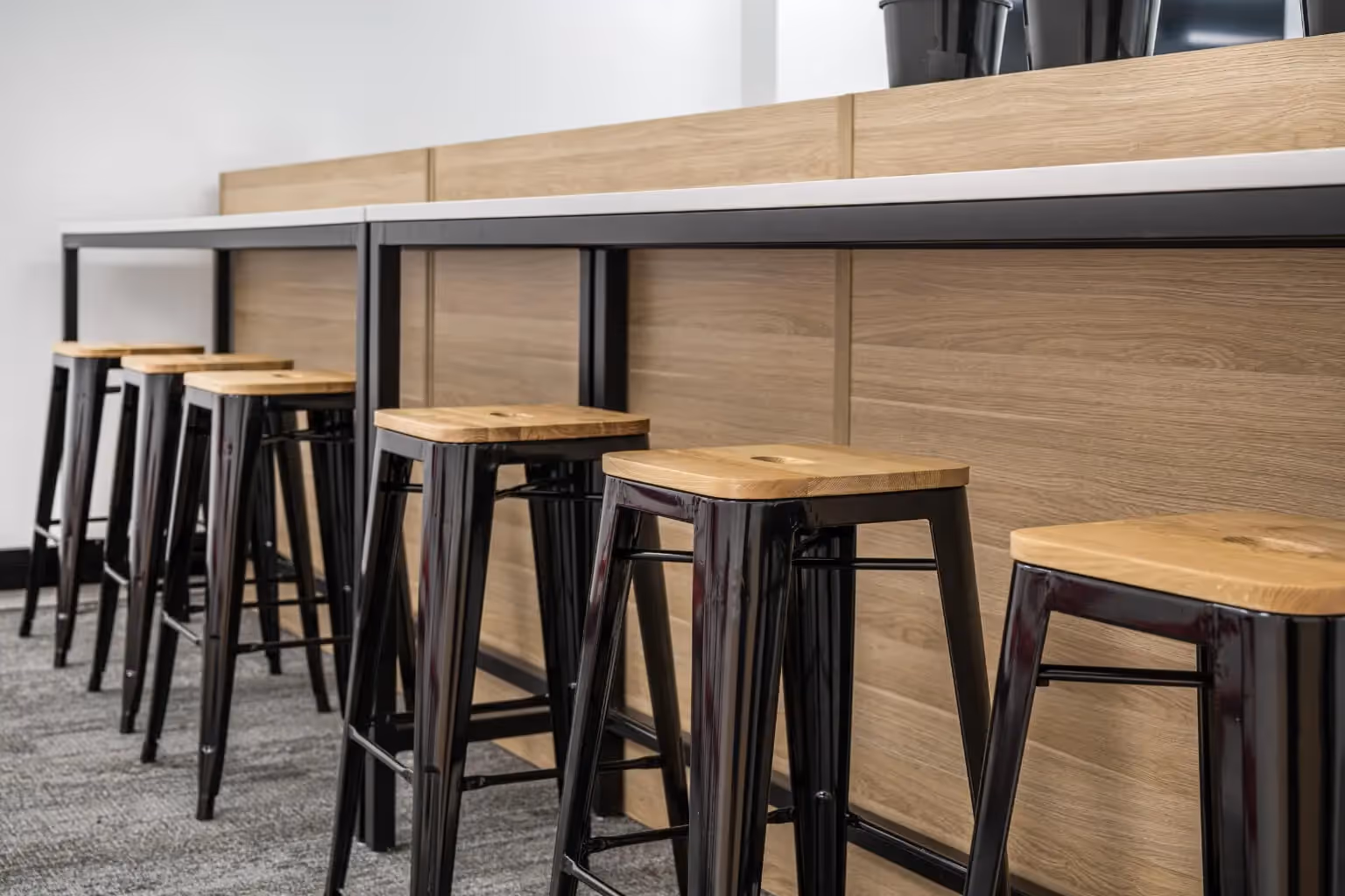 black bar stool with timber seat