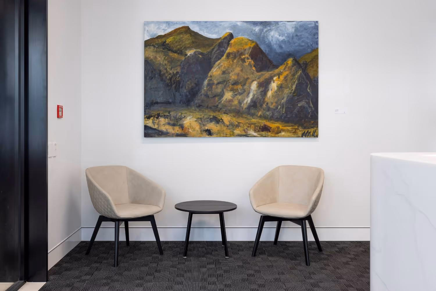 cream chairs with black legs