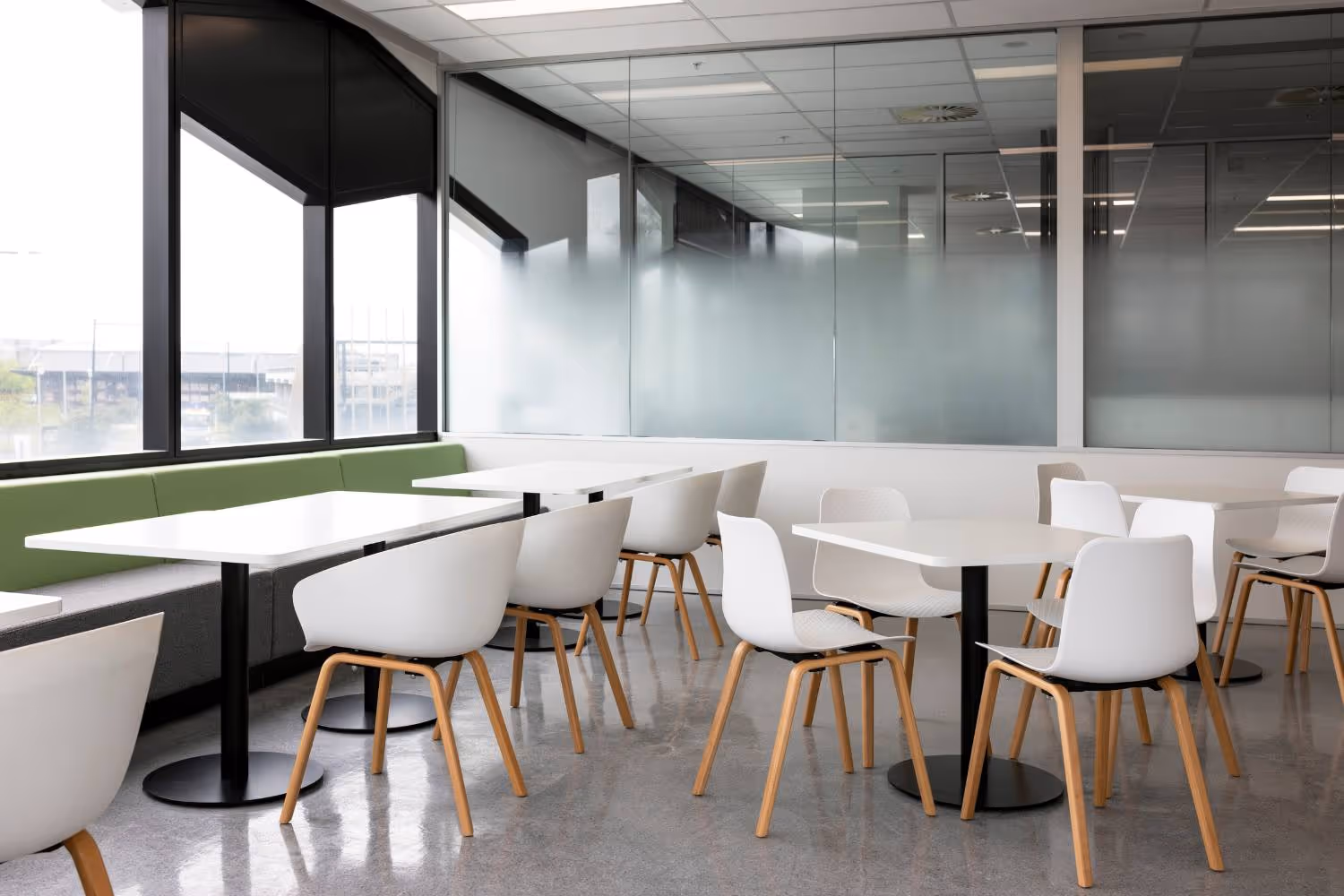 staff room with white chairs and tables