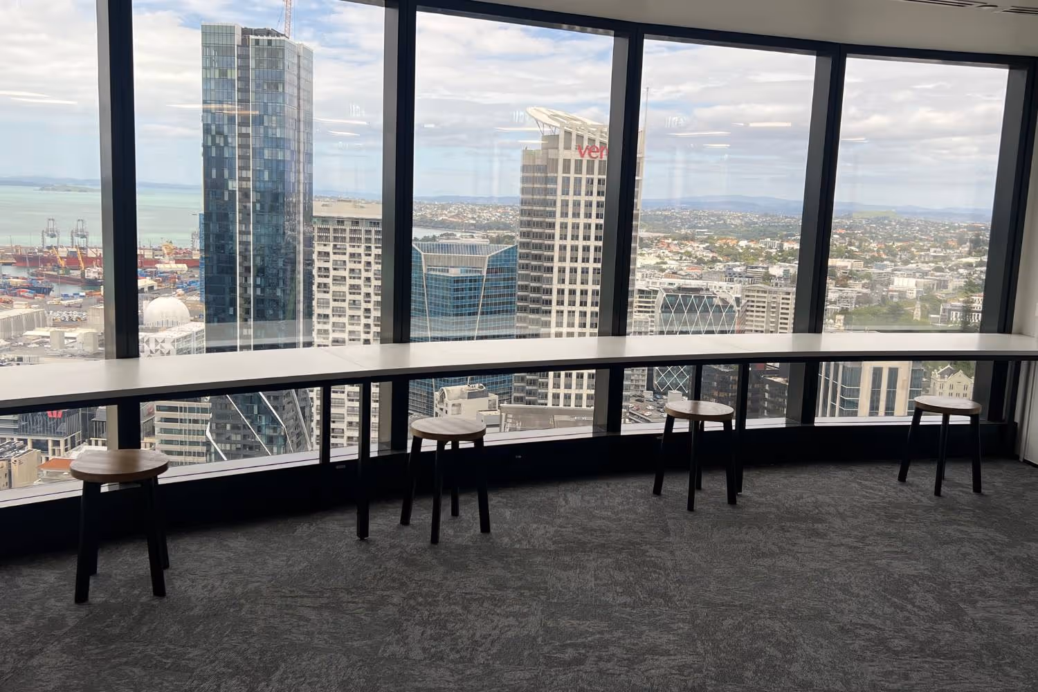 low stools and table against large window